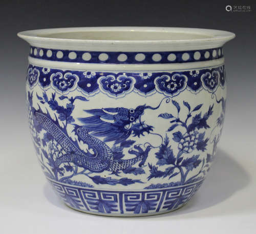 A Chinese blue and white porcelain jardiniere, probably late Qing dynasty, the body painted with two