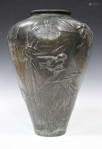 A Japanese green and brown patinated bronze vase, Meiji period, of shouldered tapering form, cast in