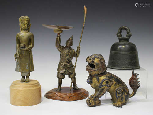 A Chinese bronze censer in the form of a seated Buddhistic lion, 19th century, with hinged head