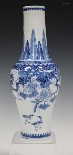 A Chinese blue and white porcelain vase, mark of Kangxi but late 19th century, the baluster body