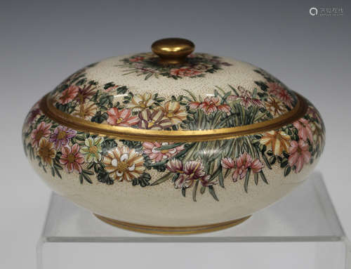 A Japanese Satsuma earthenware box and cover by Setsuzan, Meiji period, of compressed circular form,