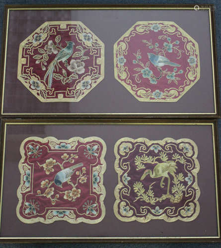 Two pairs of Chinese burgundy silk embroidered panels, 20th century, one pair of octagonal