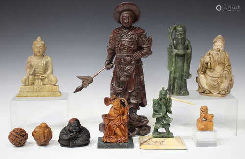 A Chinese carved hardwood figure of a warrior, 20th century, height 36cm, together with four