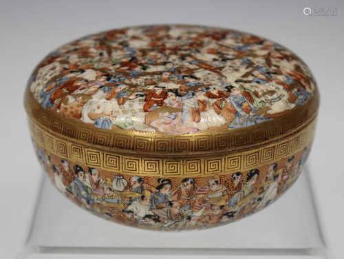 A Japanese Satsuma earthenware circular box and cover, by Kinkozan, Meiji period, the exterior