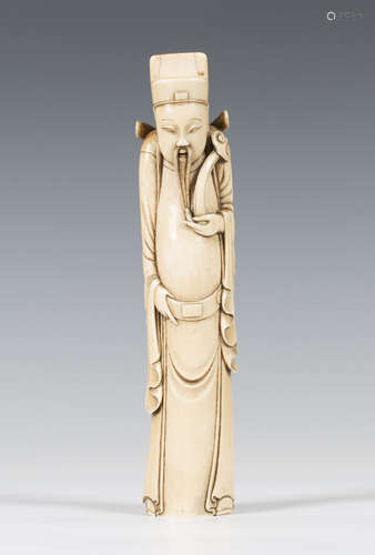 A Chinese carved ivory tusk figure of an immortal, mid-19th century, carved wearing a long robe