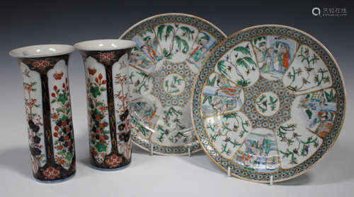 A pair of Chinese Canton famille verte porcelain plates, mid-19th century, painted with eight