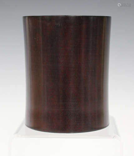 A Chinese hardwood brushpot, late Qing dynasty, of slightly waisted cylindrical form, height 10.7cm.