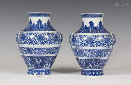 A pair of Chinese blue and white porcelain vases, mark of Qianlong but later Qing dynasty, each hu-