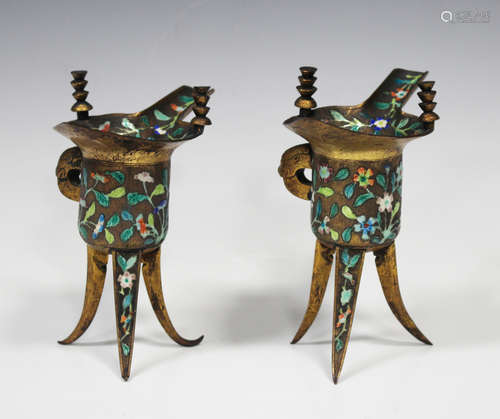 A pair of Chinese polychrome enamelled gilt metal jue vessels, probably late Qing dynasty, each