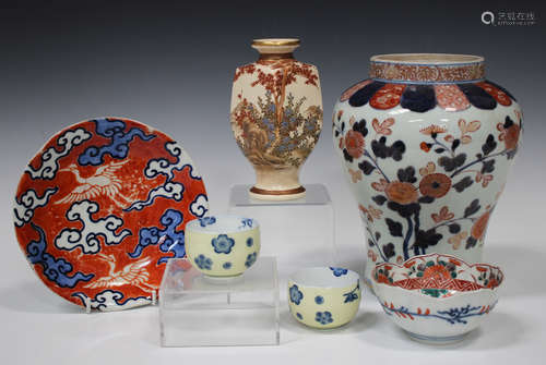 A Japanese Imari porcelain vase, early 18th century, the baluster body painted and gilt with