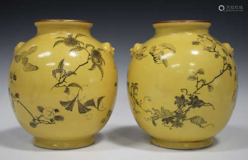 A pair of Chinese style yellow ground porcelain vases, late 19th century, of globular form with