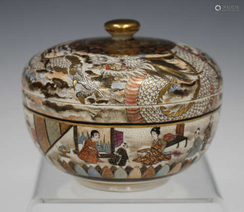 A Japanese Satsuma earthenware circular box and cover, Meiji period, the exterior painted and gilt