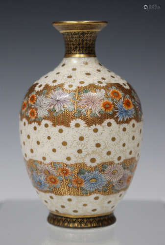 A Japanese Satsuma earthenware vase by Hozan, Meiji period, the ovoid body enamelled and gilt with