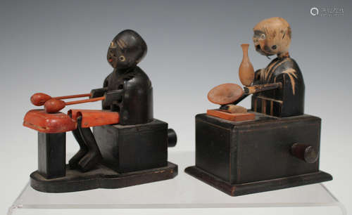 Two Japanese Kobe carved and painted wooden automaton toys, early 20th century, one modelled as a