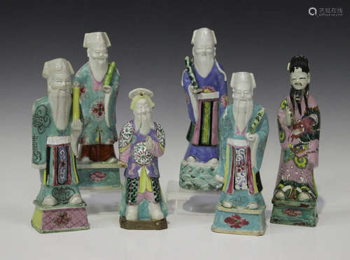 A group of six Chinese famille rose enamelled biscuit porcelain figures of immortals, 18th