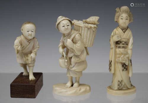 A Japanese carved ivory okimono figure, Meiji period, of a lady carrying a basket and tetsubin,