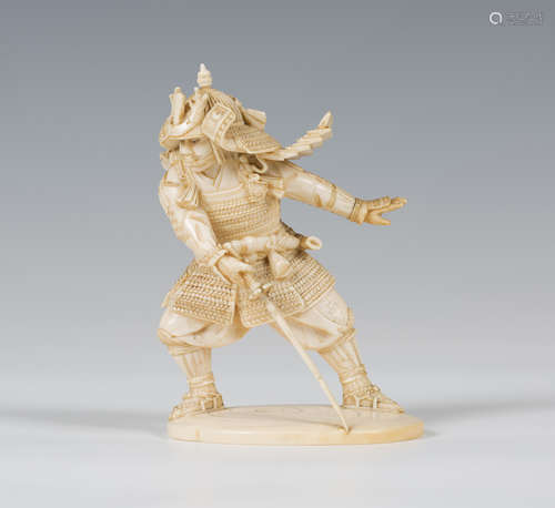 A Japanese carved ivory okimono figure, Meiji/Taisho period, finely modelled as a samurai warrior