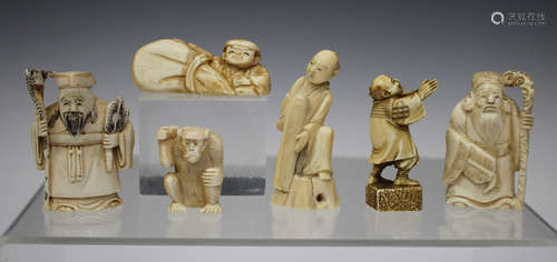 A group of five Japanese carved ivory okimono netsuke, Meiji/Taisho period, comprising one of a