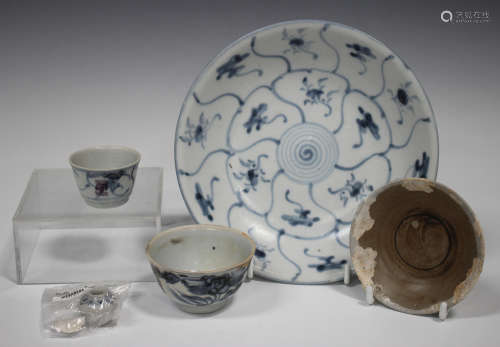 A small group of four Chinese Tek Sing Cargo, c.1820, comprising a blue and white lotus pattern