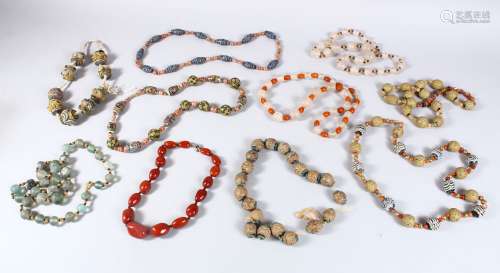 A MIXED LOT OF TEN EASTERN CERAMIC MOSAIC & CRYSTAL / GLASS BEAD NECKLACES, Various styles and