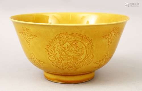 A FINE QUALITY CHINESE YELLOW GROUND INCISED DRAGON BOWL, the interior of the bowl with incised