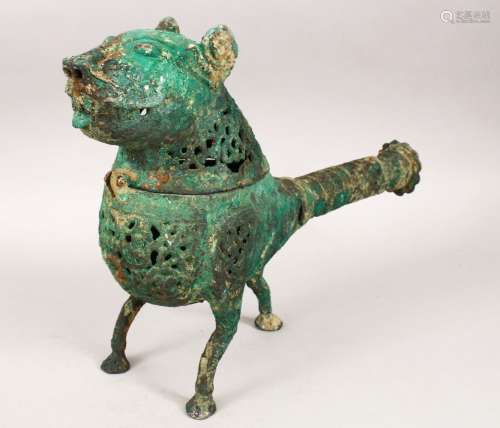 A LARGE METALWORK KHORASHAN STYLE BRONZE INCENSE BURNER IN THE FORM OF A LION, with openwork