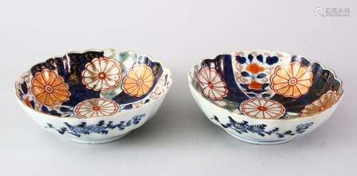 TWO JAPANESE MEIJI PERIOD FLUTED IMARI PORCELAIN BOWLS, both of fluted form, decorated with panels