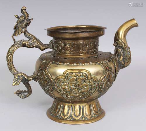 A 19TH CENTURY TIBETAN BRASS OR BRONZE ALLOY EWER, with copper rivet pins, the sides with embossed