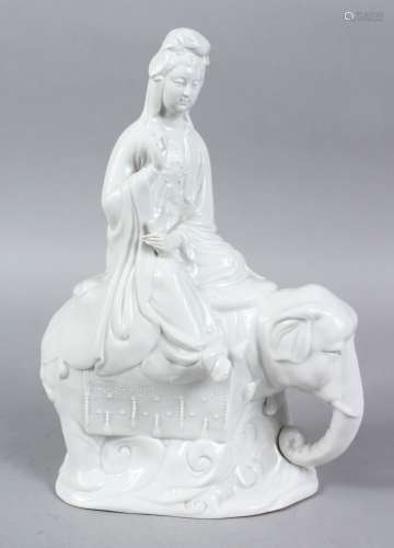 A 20TH CENTURY CHINESE BLANC DE CHINE PORCELAIN FIGURE OF GUANYIN UPON ELEPHANT, 31.5CM HIGH