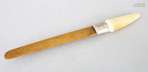 A 19TH CENTURY CHINESE CARVED IVORY & HORN PAGE TURNER, the carved bone handle ith a silver hall