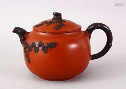 A CHINESE YIXING CLAY TEAPOT - PINE TREES, The base with an impressed seal mark, 9.5cm high x 15cm
