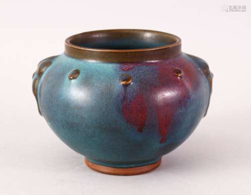 A GOOD CHINESE FLAMBE PORCELAIN CENSER, with stud decoration and twin handles, 9cm x 13cm