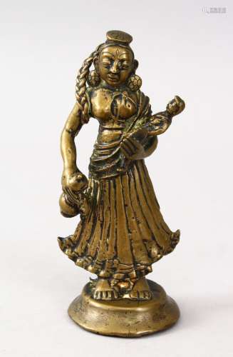 A GOOD 19TH CENTURY OR EARLIER INDIAN BRONZE FIGURE OF A GODDESS HOLDING A CHILD, 13.5cm high.