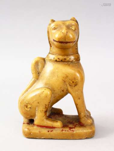 A FINE 18TH / 19TH CENTURY INDIAN POLYCHROMED CARVED MARBLE FIGURE OF A LION, the lion seated upon a