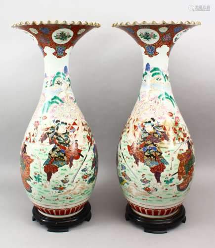 A LARGE PAIR OF JAPANESE MEIJI PERIOD FLARED TOP PORCELAIN KUTANI WARRIOR VASES, each of the vases