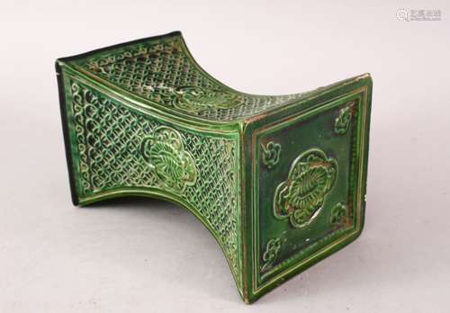 A GOOD CHINESE MING STYLE GREEN GLAZED POTTERY PILLOW, with geometric and panel decoration, 16.5cm x