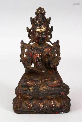 A GOOD EARLY CHINESE BRONZE BUDDHA / DEITY, in a seated position on a lotus base, holding a fruit or