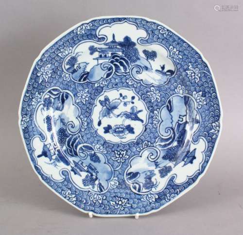 A GOOD 18TH CENTURY CHINESE QIANLONG BLUE & WHITE PORCELAIN PLATE, decorated with panels of