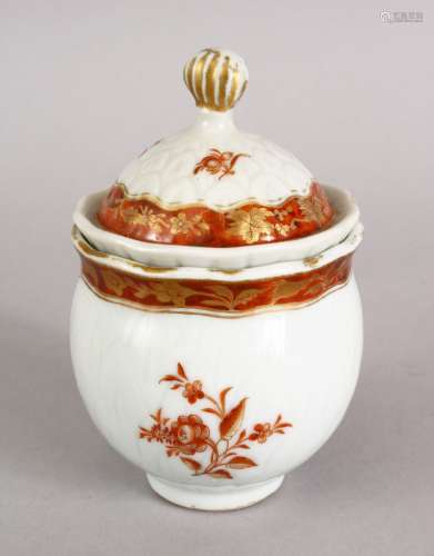 A GOOD 18TH CENTURY CHINESE IRON RED & GILT DECORATED LIDDED POT, decorated with floral spray and