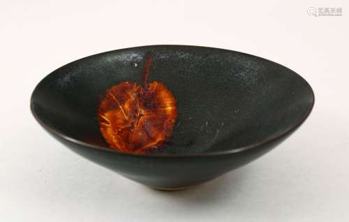 A CHINESE JIAN WARE SONG STYLE PORCELAIN BOWL, decorated with a leaf interior, the base unglazed,