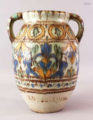 A LARGE NORTH AFRICAN TWIN HANDLE SIGNED POTTERY JAR, with a varying colour drip style decoration