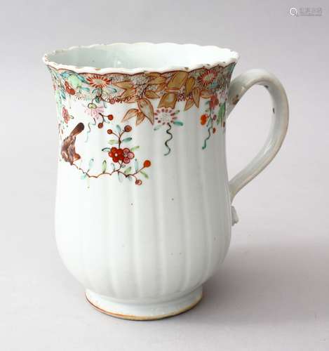 A GOO 18TH CENTURY CHINESE QIANLONG FAMILLE ROSE PORCELAIN TANKARD, the body of the moulded