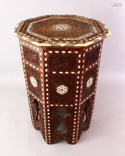 A FINE 19TH CENTURY BONE & MOTHER OF PEARL INLAID OCTAGONAL CARVED WOODEN TABLE, the top and sides