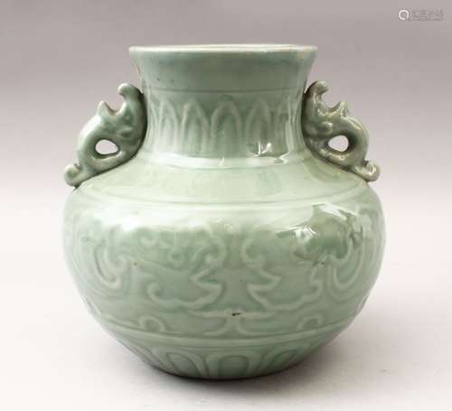 A GOOD CHINESE CELADON TWIN HANDLE PORCELAIN VASE, with moulded chilong decoration to the body, with