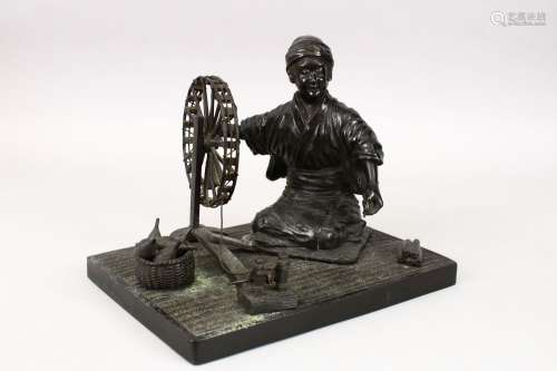 A GOOD JAPANESE MEIJI PERIOD BRONZE OKIMONO - SILK SPINNER, the depicting the scene a worker