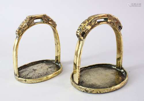 TWO 19TH CENTURY MONGOLIAN BRONZE STIRRUPS, 17CM HIGH & 16CM HIGH.