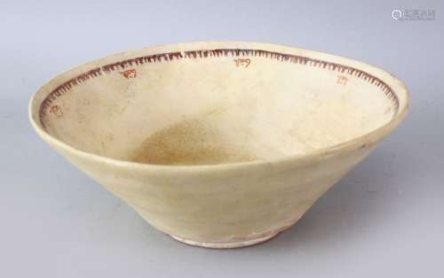 AN IRANIAN NISHABOUR POTTERY BOWL WITH CALLIGRAPHY, the inner decorated with calligraphy, 24cm.