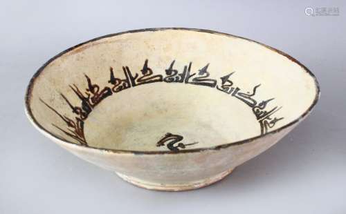 AN IRANIAN NISHABOUR POTTERY BOWL WITH A BIRD, the inner decorated with a bird, 24.5cm.