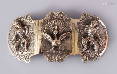 A GOOD BURMESE WHITE METAL EMBOSSED THREE PIECE BELT BUCKLE, Embossed with figures and animals,