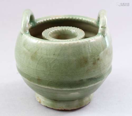 A GOOD CHINESE SONG STYLE CELADON PORCELAIN CANDLESTICK HOLDER, with twin moulded handles and